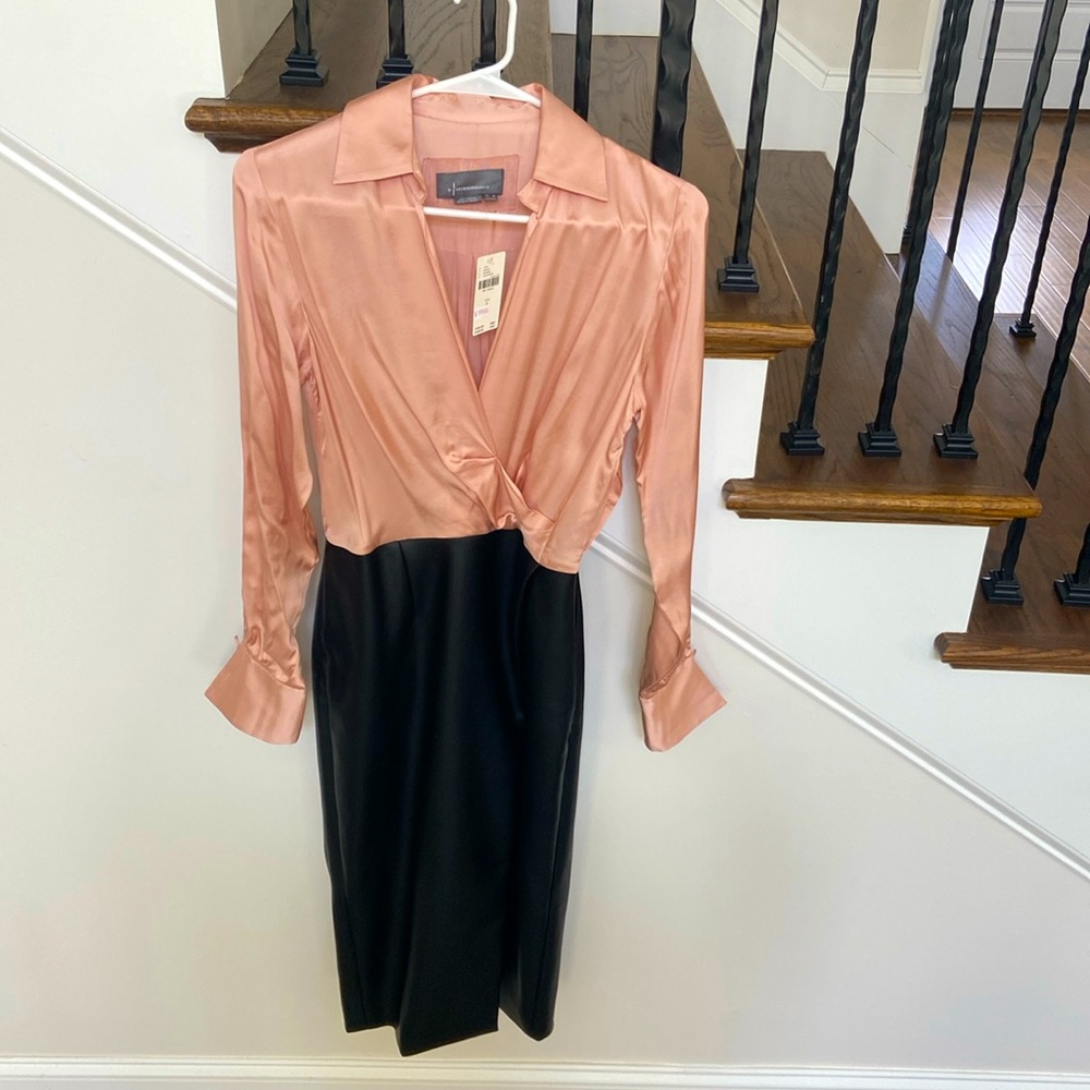 New Anthropologie dress. Silky top, attached with black vegan leather skirt.